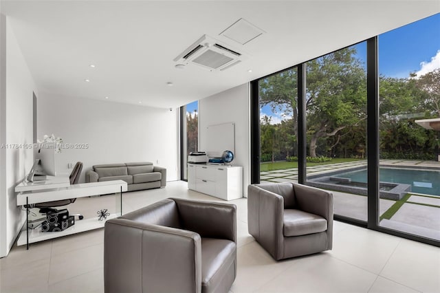 tiled living room featuring expansive windows
