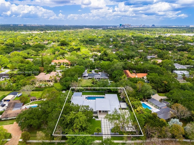 aerial view of property's location with property boundaries highlighted and a pool area