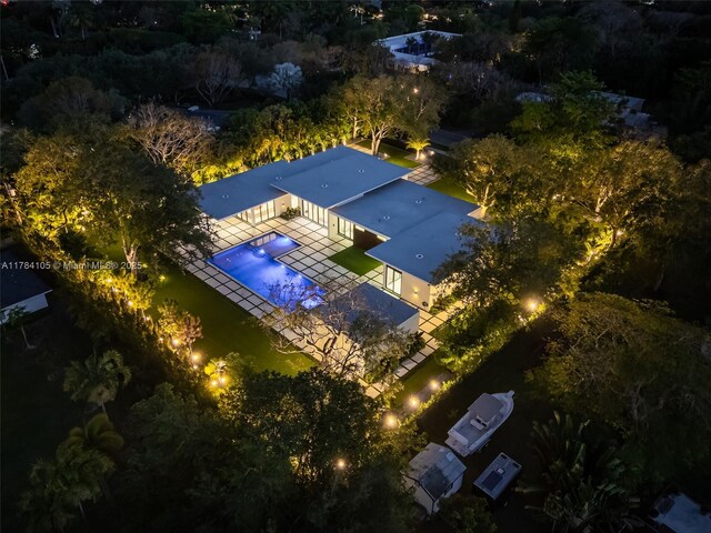 view of subject property featuring a pool
