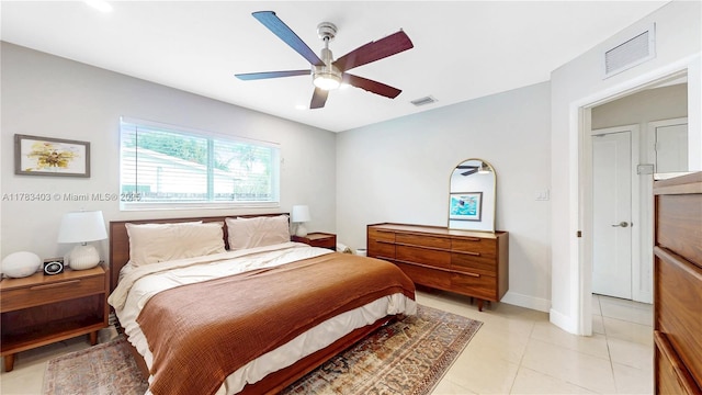 8435 SW 157th St, Palmetto Bay, FL 33157 - bedroom with visible vents, baseboards, a ceiling fan, and light tile patterned floors