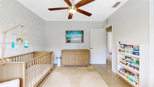 8435 SW 157th St, Palmetto Bay, FL 33157 - tiled bedroom with visible vents, baseboards, wallpapered walls, and ceiling fan