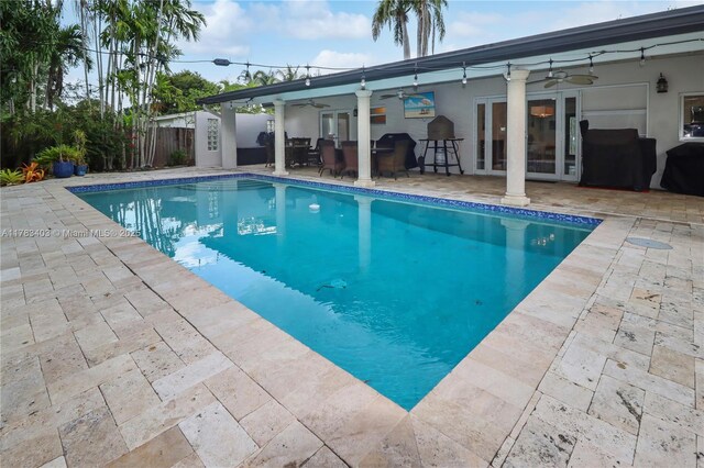 8435 SW 157th St, Palmetto Bay, FL 33157 - view of pool with a fenced in pool, french doors, a ceiling fan, a patio area, and fence