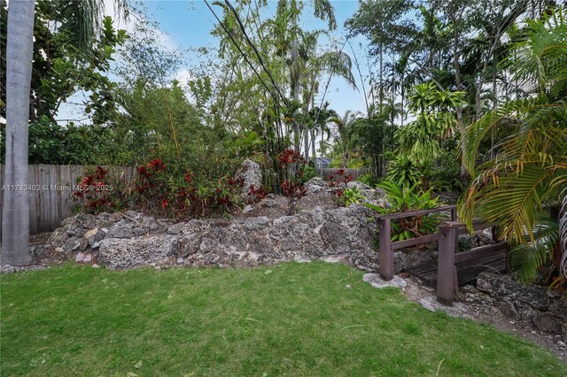 8435 SW 157th St, Palmetto Bay, FL 33157 - view of yard with a fenced backyard