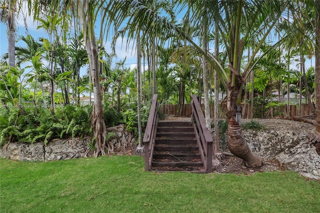 8435 SW 157th St, Palmetto Bay, FL 33157 - view of yard featuring fence and stairs