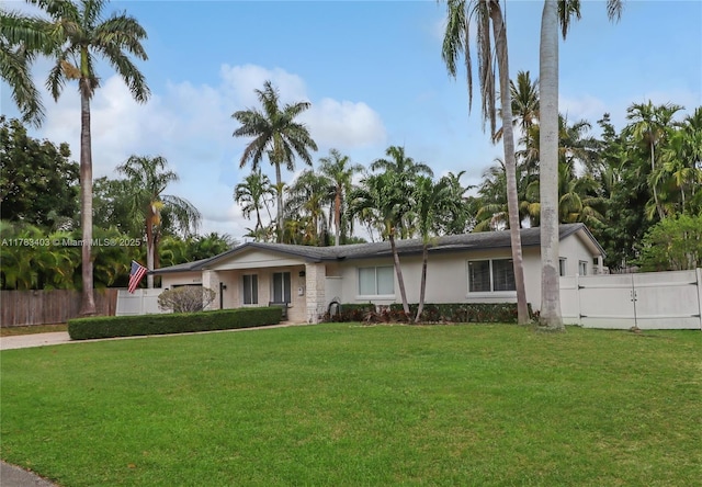 8435 SW 157th St, Palmetto Bay, FL 33157 - single story home featuring stucco siding, fence, a front yard, and a gate