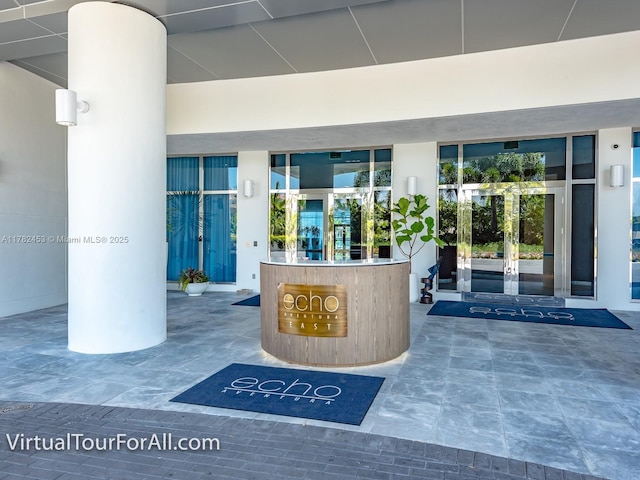 property entrance featuring french doors