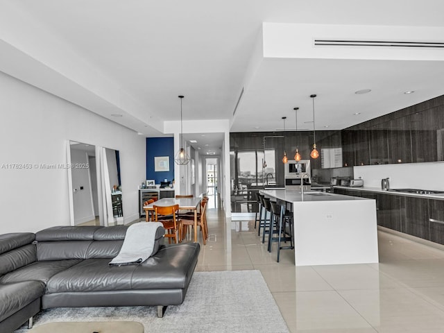 living area with light tile patterned floors