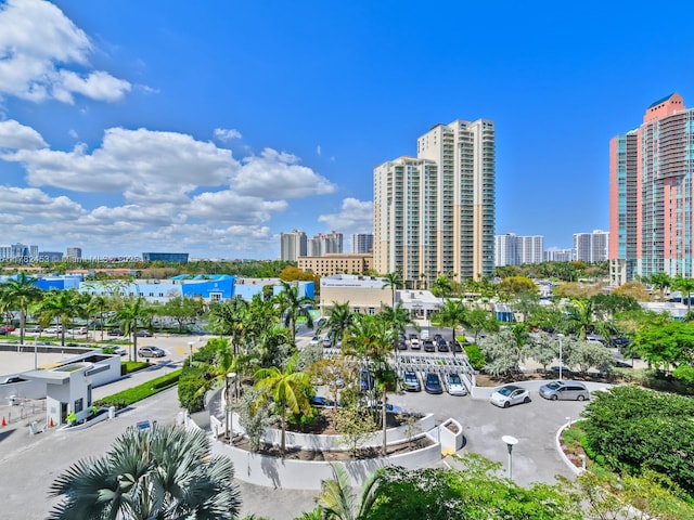 birds eye view of property featuring a view of city