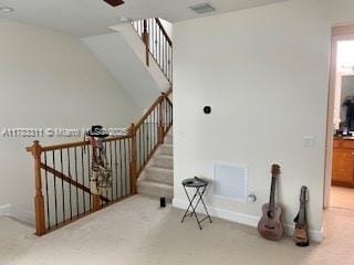 3142 NW 124th Way, Sunrise, FL 33323 - staircase with carpet flooring, ceiling fan, baseboards, and vaulted ceiling