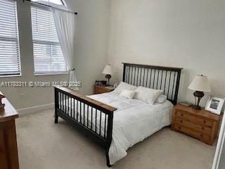 3142 NW 124th Way, Sunrise, FL 33323 - bedroom featuring carpet floors and baseboards