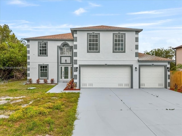9150 Genesee St, Port Charlotte, FL 33981 - view of front facade with a garage, driveway, stucco siding, and a front lawn