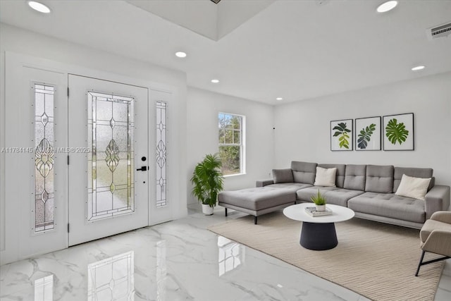 9150 Genesee St, Port Charlotte, FL 33981 - living area featuring visible vents, recessed lighting, and marble finish floor