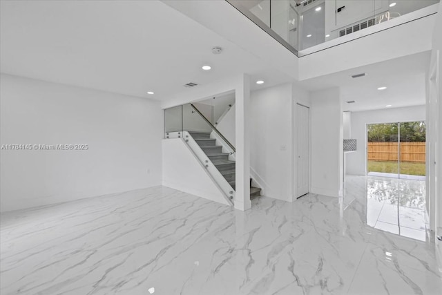 9150 Genesee St, Port Charlotte, FL 33981 - interior space with marble finish floor, recessed lighting, visible vents, and stairs