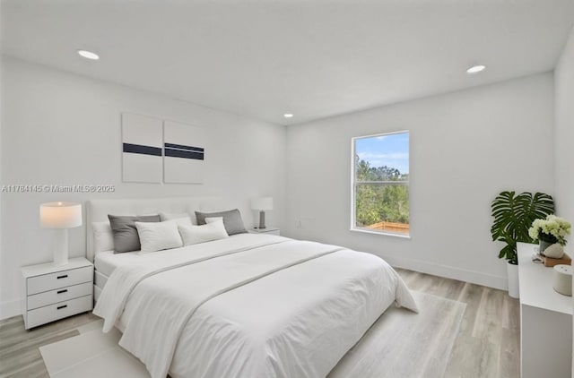 9150 Genesee St, Port Charlotte, FL 33981 - bedroom featuring recessed lighting, light wood-style floors, and baseboards
