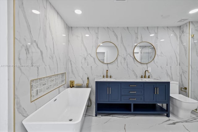 9150 Genesee St, Port Charlotte, FL 33981 - bathroom with a freestanding tub, marble finish floor, a sink, and tile walls