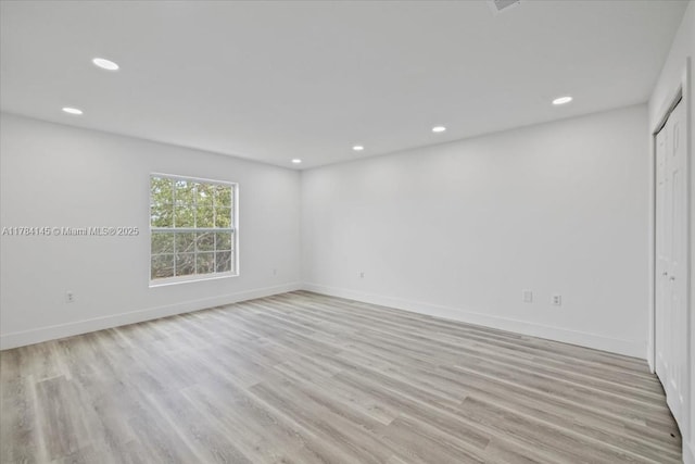 9150 Genesee St, Port Charlotte, FL 33981 - unfurnished room featuring light wood-style flooring and recessed lighting