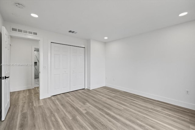 9150 Genesee St, Port Charlotte, FL 33981 - unfurnished bedroom featuring light wood-style floors, baseboards, and visible vents