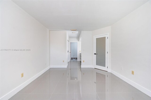 8352 SW 148th Ave, Miami, FL 33193 - tiled empty room with baseboards