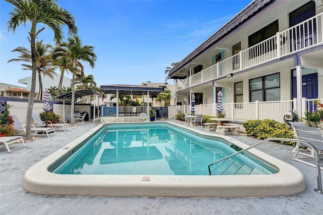 322 Taylor St Unit 1D, Hollywood, FL 33019 - community pool featuring a patio