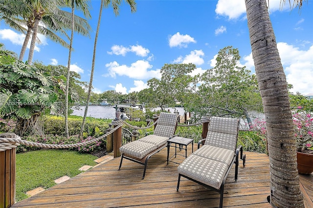 wooden deck with a water view