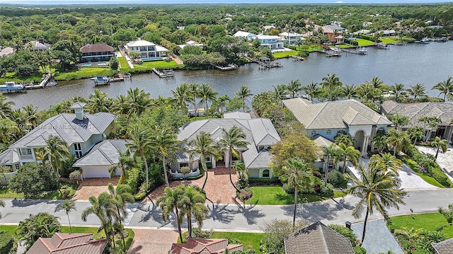 bird's eye view with a residential view and a water view