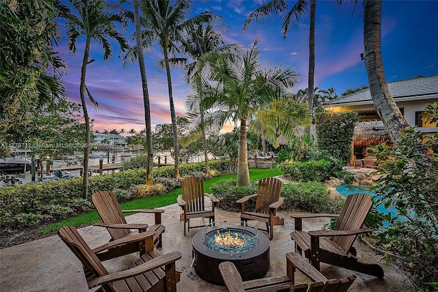 view of patio with a fire pit