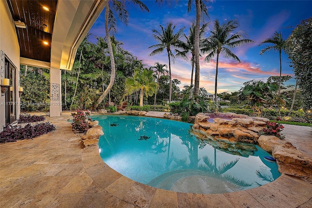 outdoor pool with a patio