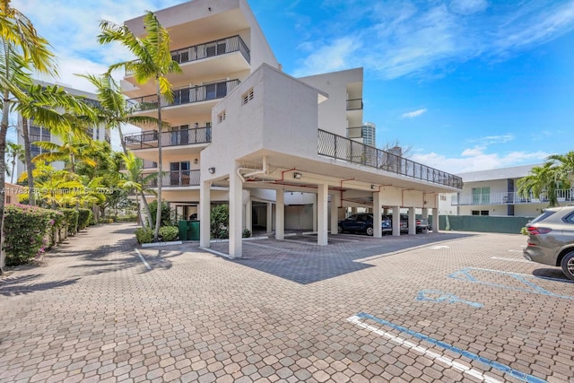 1918 Brickell Ave Unit 204, Miami, FL 33129 - view of building exterior with covered and uncovered parking