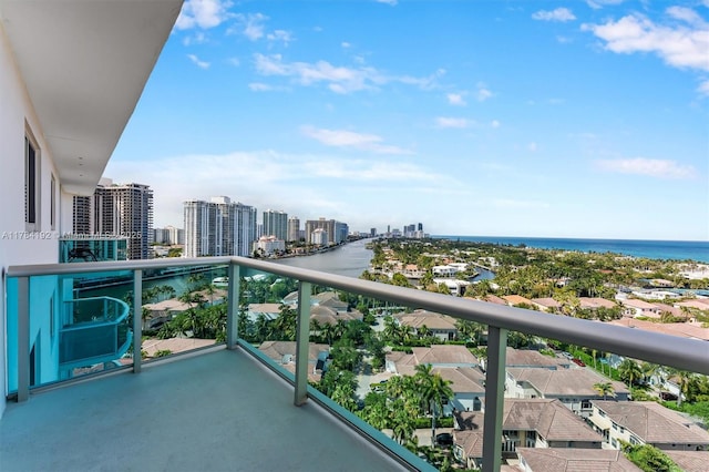 balcony with a city view and a water view