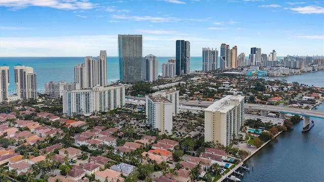 aerial view featuring a water view and a view of city