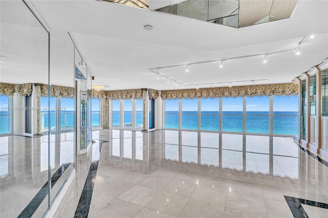 interior space with a water view
