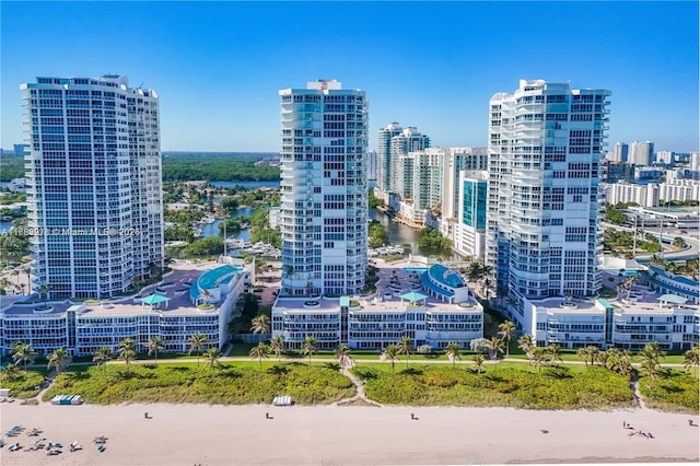 view of city with a view of the beach and a water view