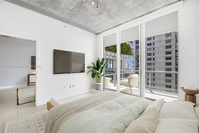 3470 E Coast Ave Unit H2706, Miami, FL 33137 - bedroom with tile patterned flooring, access to outside, and expansive windows