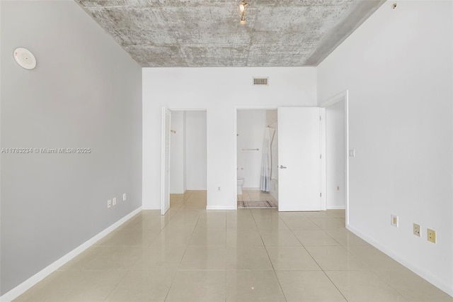 3470 E Coast Ave Unit H2706, Miami, FL 33137 - empty room with light tile patterned flooring and a smoke detector