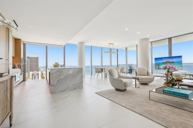 2000 S Ocean Dr Unit 28A, Hallandale Beach, FL 33009 - living area with a wall of windows and a wealth of natural light