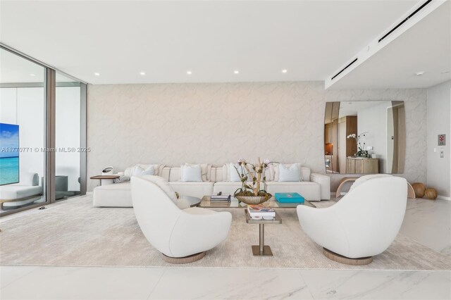 2000 S Ocean Dr Unit 28A, Hallandale Beach, FL 33009 - living area with marble finish floor, recessed lighting, and floor to ceiling windows