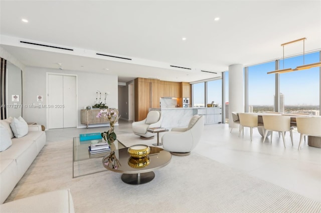 2000 S Ocean Dr Unit 28A, Hallandale Beach, FL 33009 - living room with a wall of windows and recessed lighting