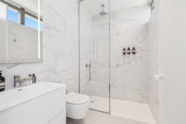 2000 S Ocean Dr Unit 28A, Hallandale Beach, FL 33009 - bathroom featuring tile walls, toilet, vanity, and a marble finish shower