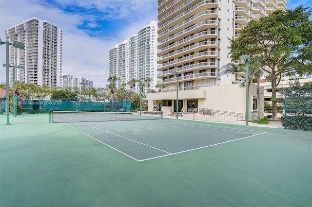 20191 E Country Club Dr Unit 802, Aventura, FL 33180 - view of tennis court with fence