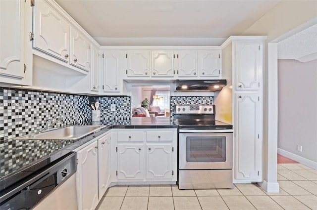 3000 Riverside Dr Unit 309-1, Coral Springs, FL 33065 - kitchen featuring light tile patterned floors, a sink, appliances with stainless steel finishes, under cabinet range hood, and white cabinetry
