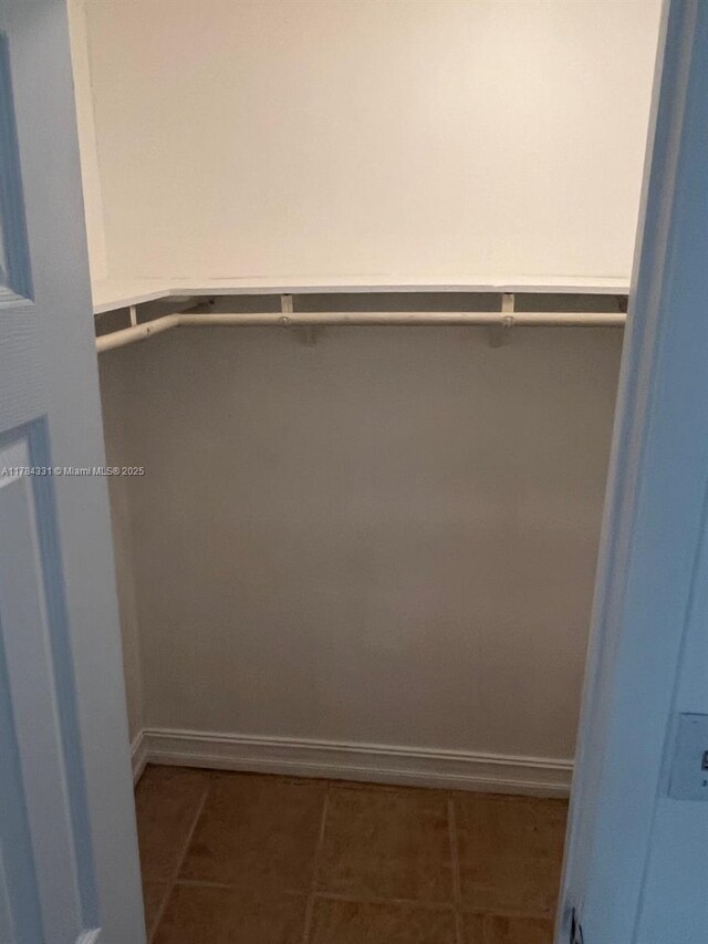 5955 NW 25th Ct Unit 208, Sunrise, FL 33313 - walk in closet with tile patterned floors
