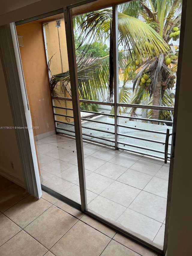 5955 NW 25th Ct Unit 208, Sunrise, FL 33313 - doorway with tile patterned floors and healthy amount of natural light