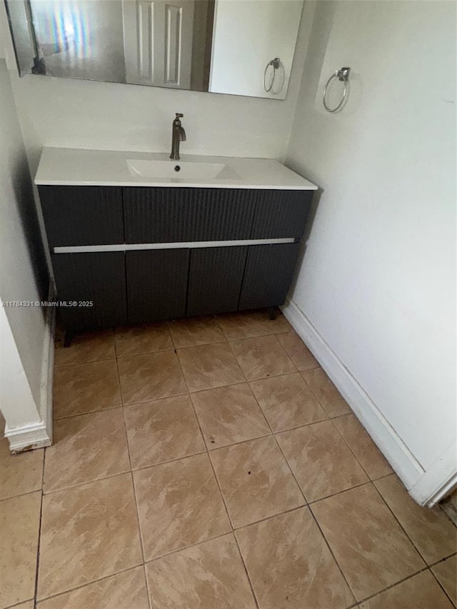 5955 NW 25th Ct Unit 208, Sunrise, FL 33313 - bathroom featuring vanity and tile patterned flooring