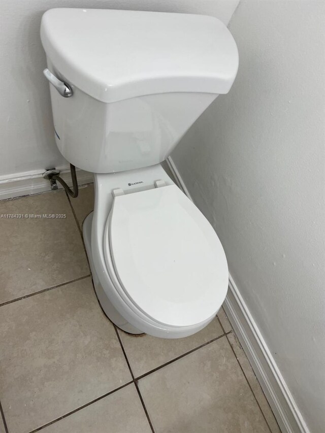 5955 NW 25th Ct Unit 208, Sunrise, FL 33313 - detailed view of baseboards and toilet