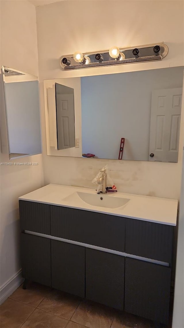 5955 NW 25th Ct Unit 208, Sunrise, FL 33313 - bathroom featuring vanity and tile patterned floors
