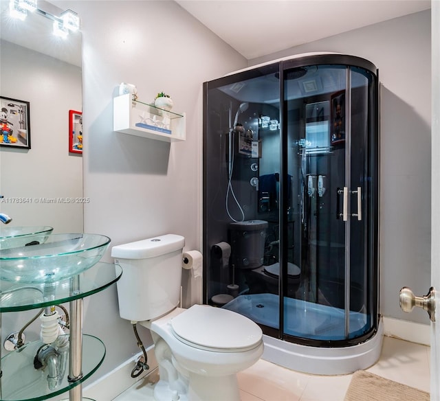 1000 NE 204th Ln, Miami, FL 33179 - full bath featuring toilet, baseboards, tile patterned floors, and a stall shower
