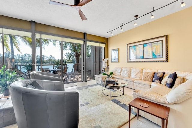 living room with a ceiling fan