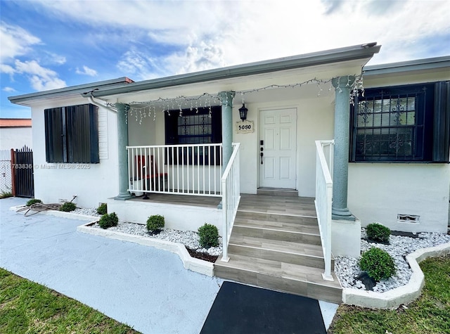 5080 E 5th Ave, Hialeah, FL 33013 - view of front of home with a porch