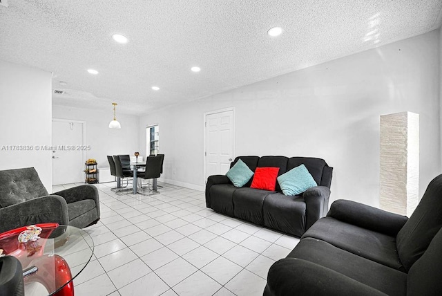5080 E 5th Ave, Hialeah, FL 33013 - living area with a textured ceiling, recessed lighting, and light tile patterned floors
