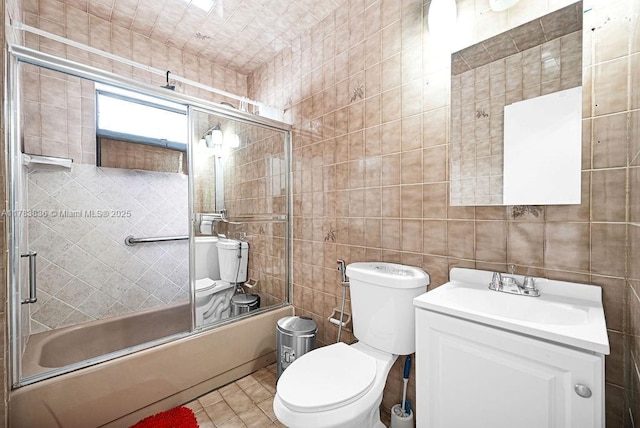 5080 E 5th Ave, Hialeah, FL 33013 - full bath with combined bath / shower with glass door, vanity, and tile walls